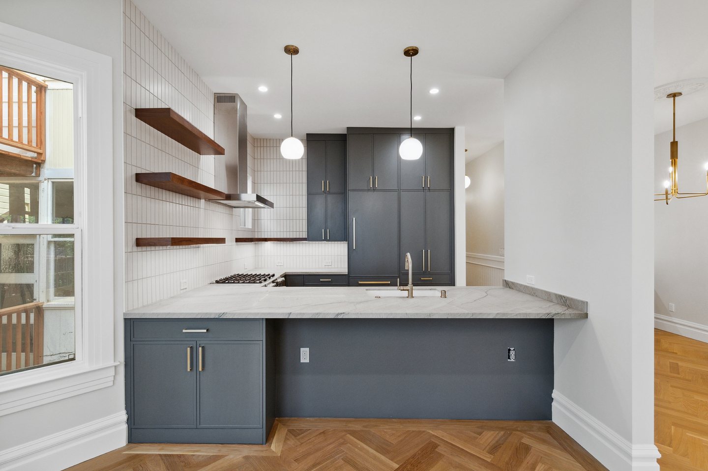 Victorian kitchen — dark cabinetry and stone island